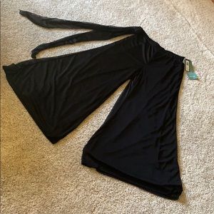 Brand new black sheer overlay pants.